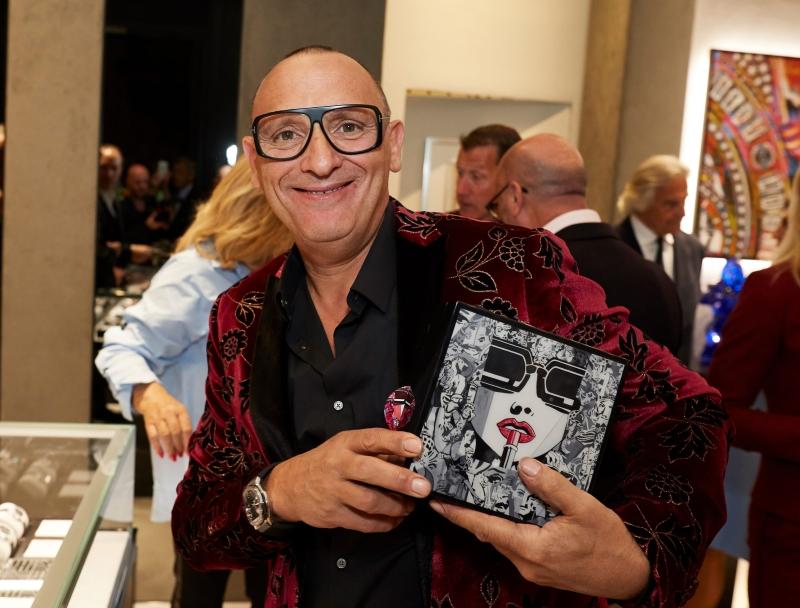 Marc Ferrero with his artwork 