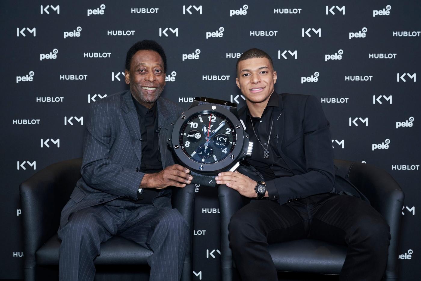 Pelé and Kylian Mbappé with a Hublot wall clock